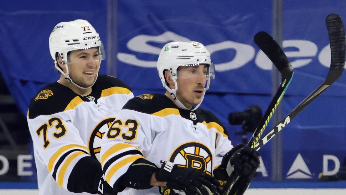 Charlie McAvoy et Brad Marchand