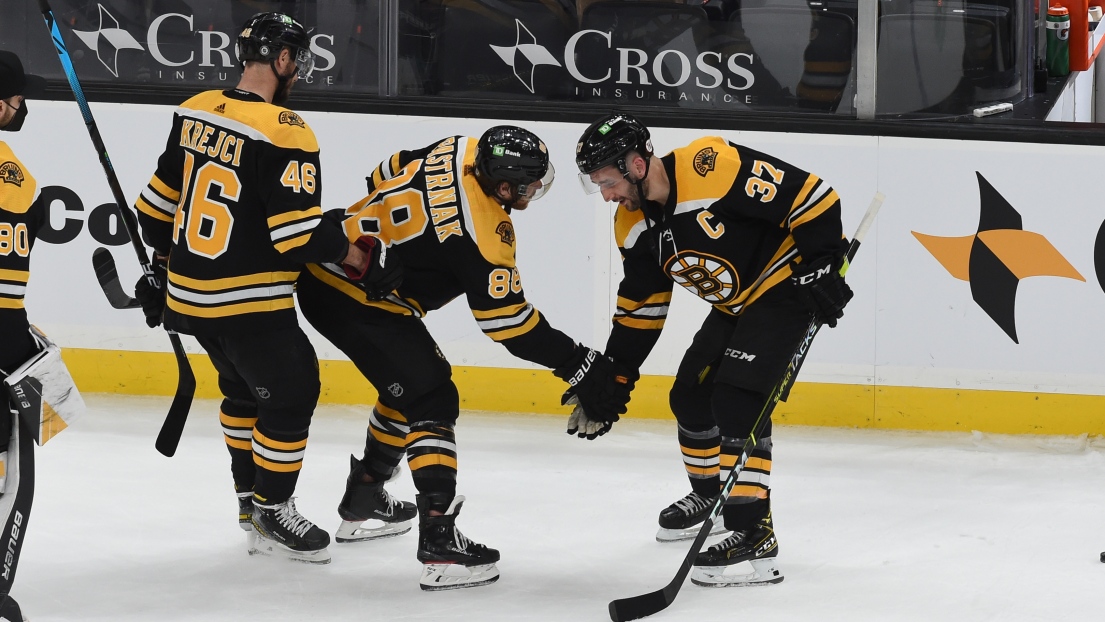 David Pastrnak et Patrice Bergeron