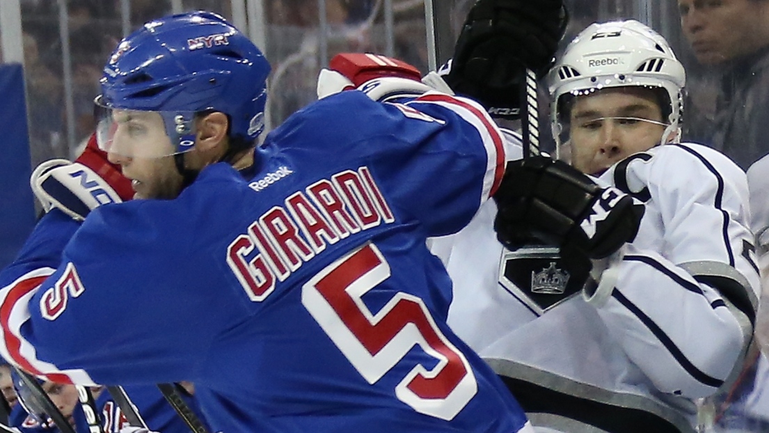 Dan Girardi et Dustin Brown