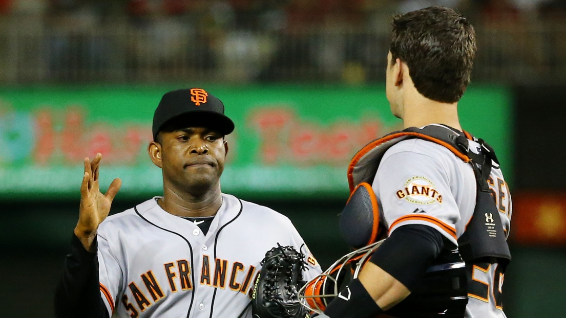 Santiago Casilla et Buster Posey