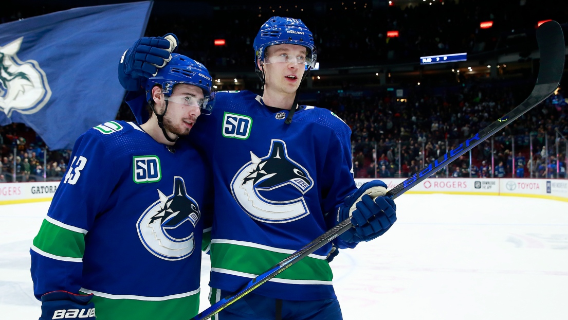 Quinn Hughes et Elias Pettersson