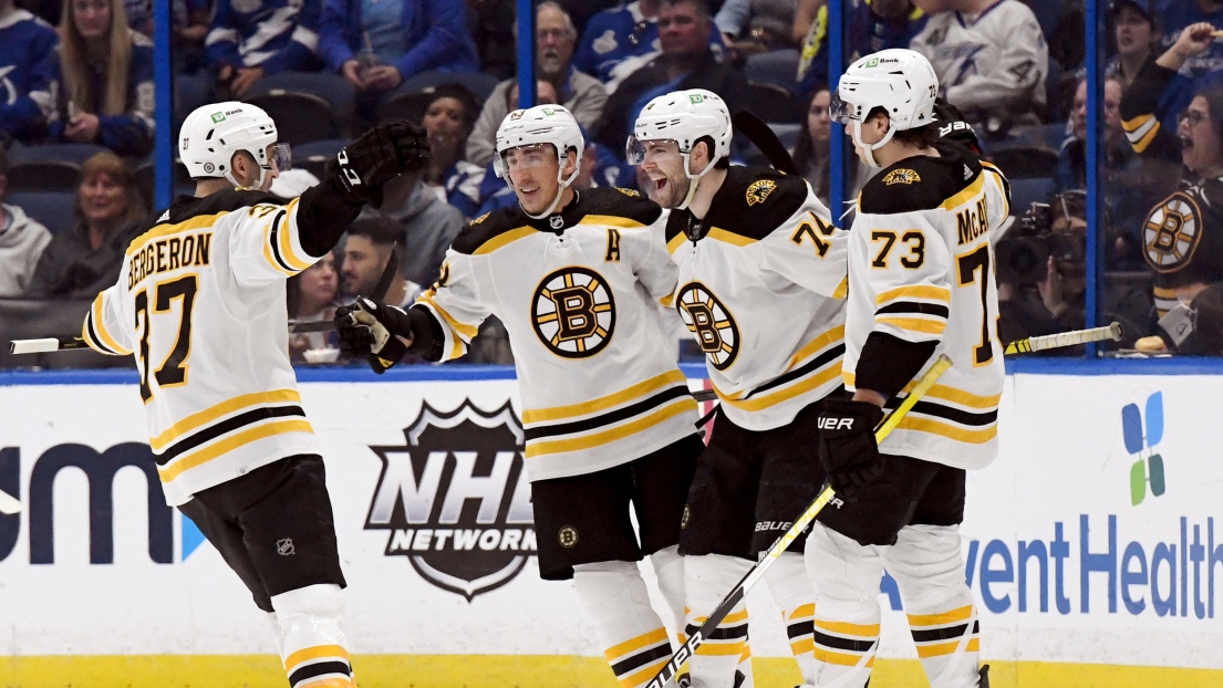 Patrice Bergeron, Brad Marchand, Jake DeBrusk et Charlie McAvoy