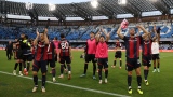 Les joueurs de Bologne célèbrent leur victoire