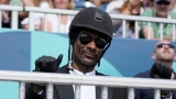 Snoop Dogg habillé en cavalier