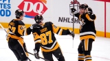 Rickard Rakell, Sidney Crosby et Bryan Rust