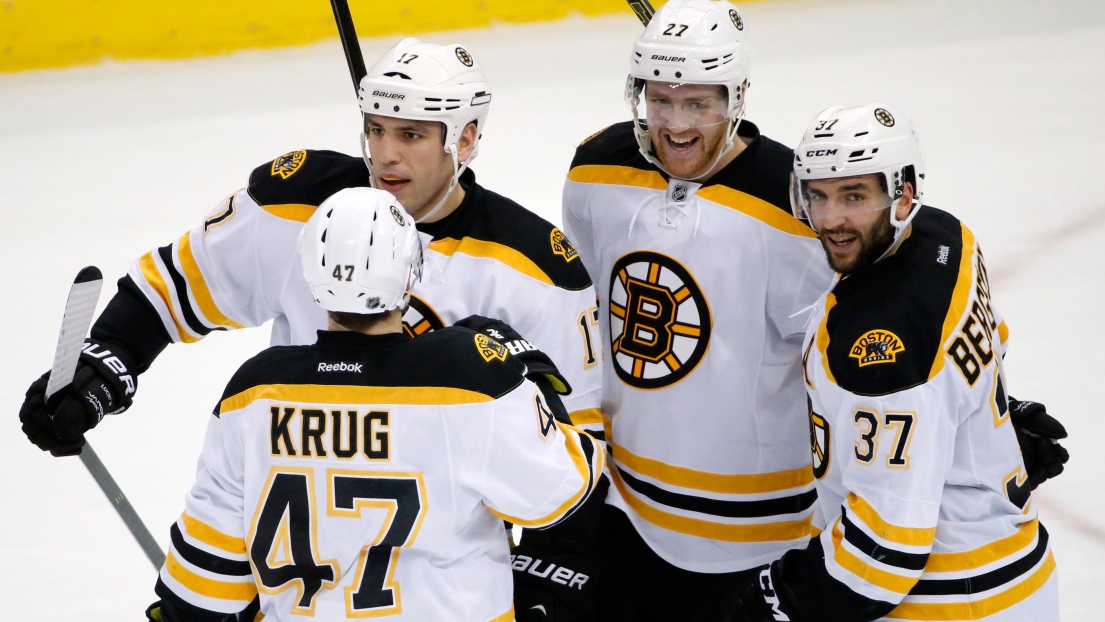 Patrice Bergeron, Milan Lucic, Torey Krug et Dougie Hamilton