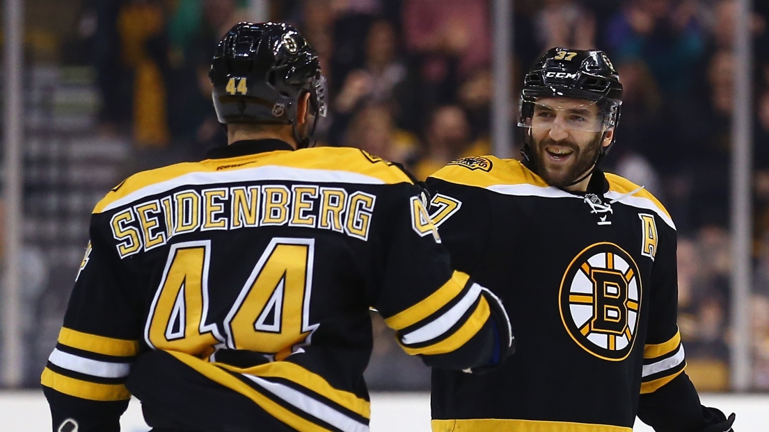 Patrice Bergeron et Dennis Seidenberg