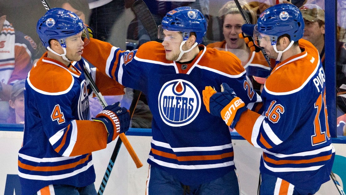 Taylor Hall, Leon Draisaitl et Teddy Purcell 