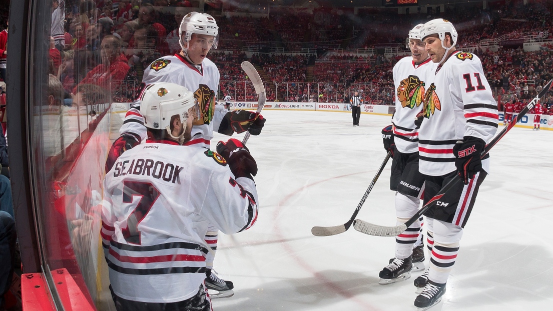 Brent Seabrook, Andrew Desjardins, Tomas Fleischmann et Teuvo Teravainen