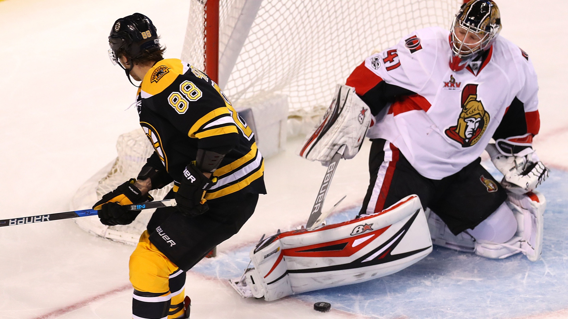 Craig Anderson et David Pastrnak Craig Anderson et David Pastrnak