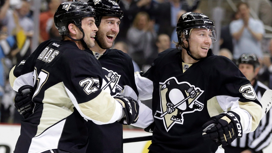 Craig Adams, Tanner Glass et Jussi Jokinen