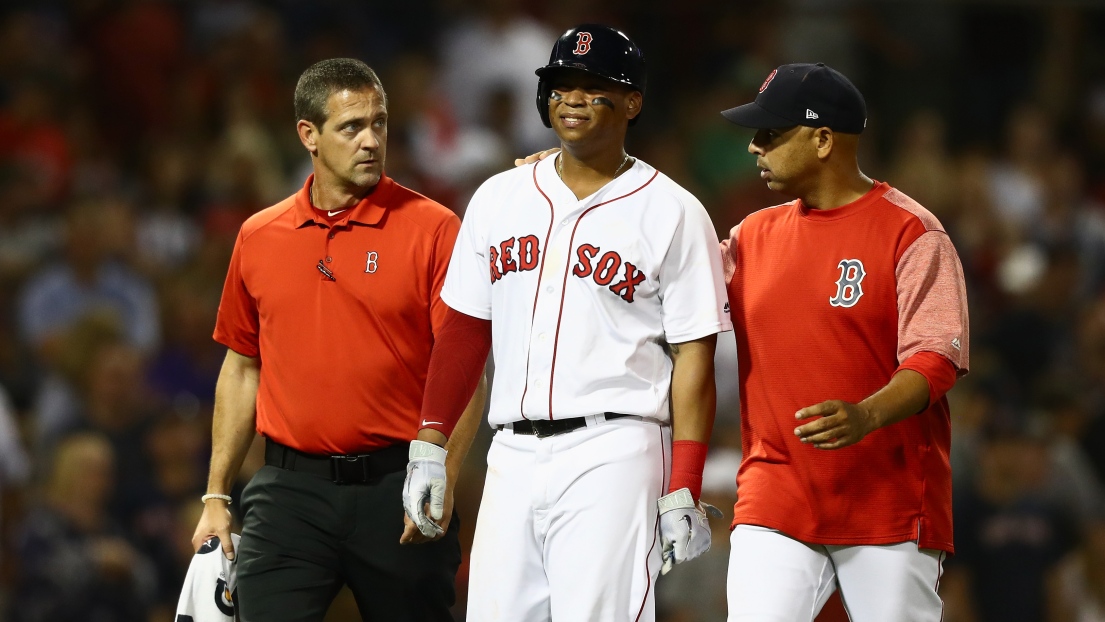 Rafael Devers et Alex Cora