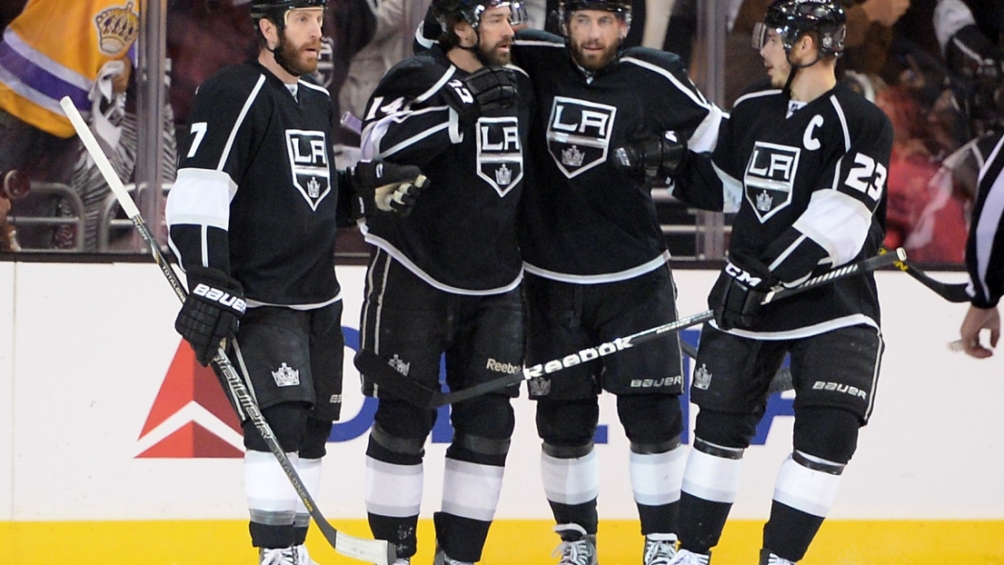 Rob Scuderi, Justin Williams, Jarret Stoll et Dustin Brown