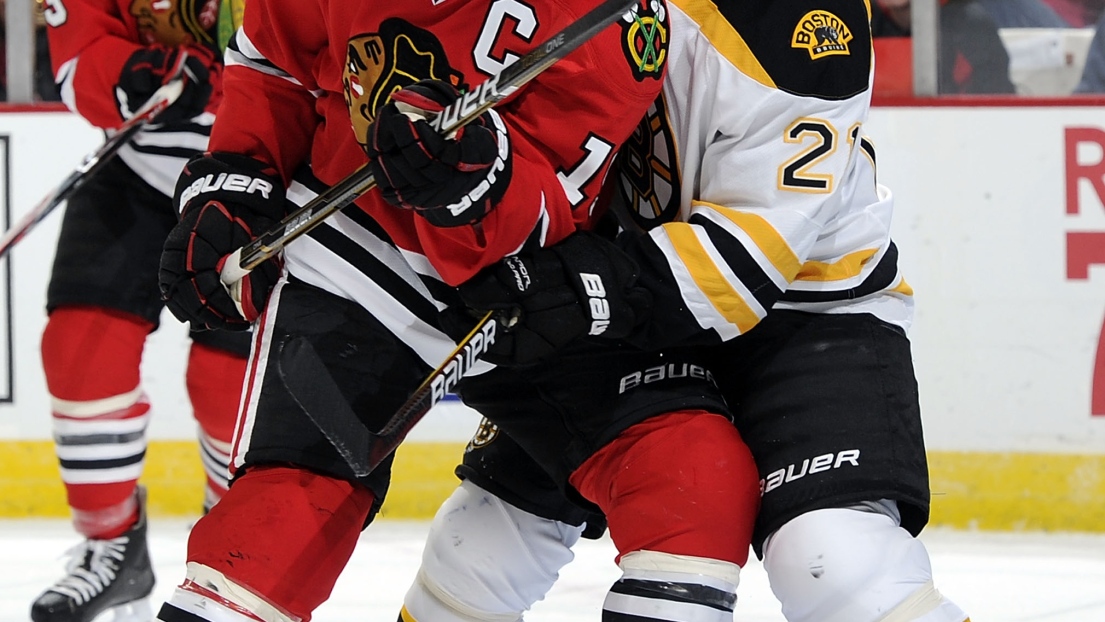 Jonathan Toews et Andrew Ference