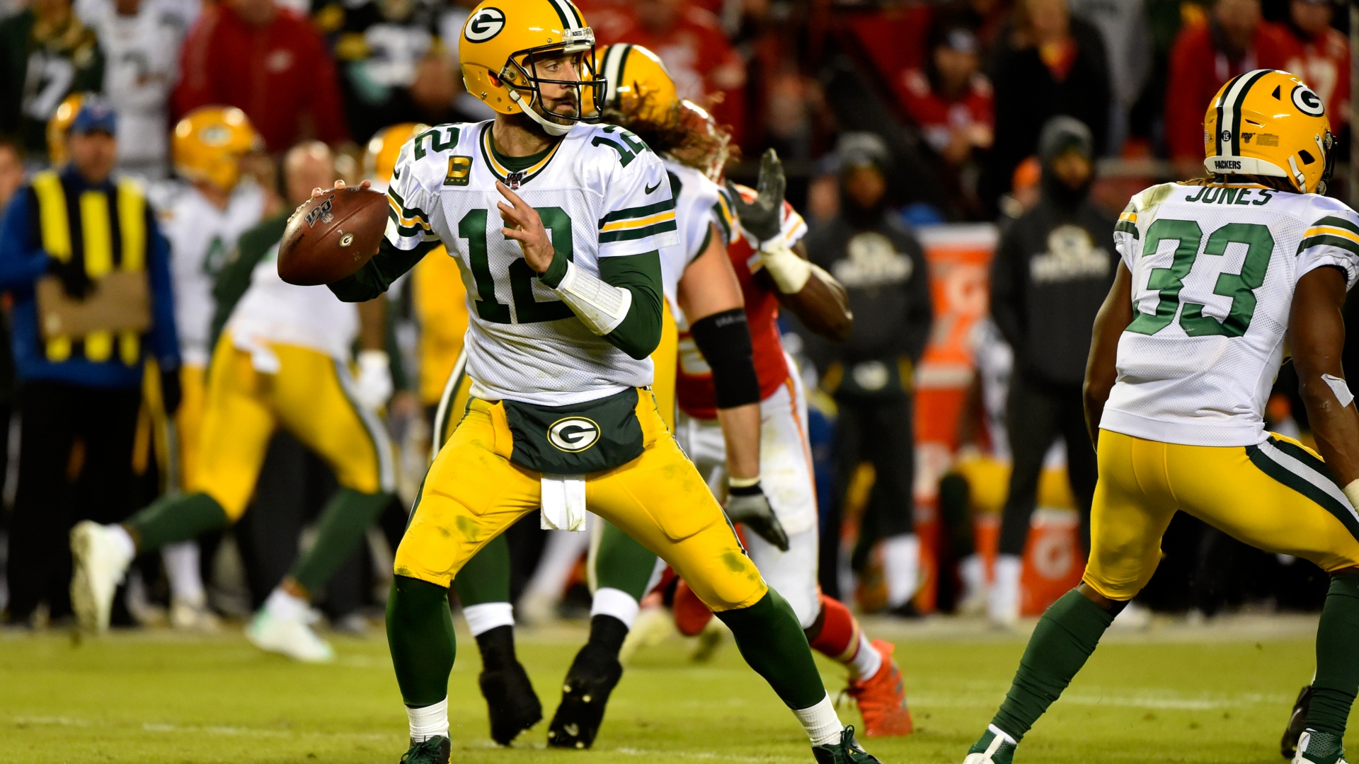 Aaron Rodgers (12), Aaron Jones (33)