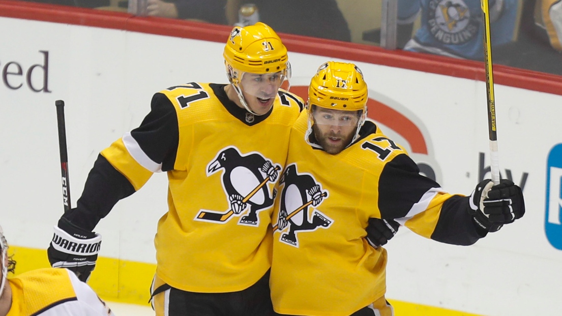 Evgeni Malkin et Bryan Rust