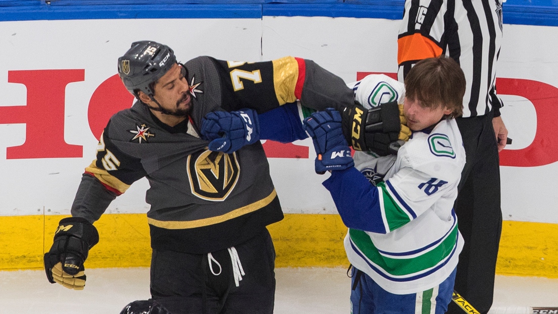 Ryan Reaves et Jake Virtanen