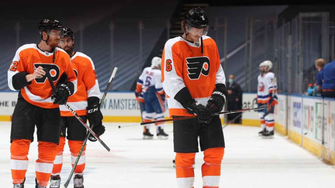 Matt Niskanen, Michael Raffl et Travis Sanheim