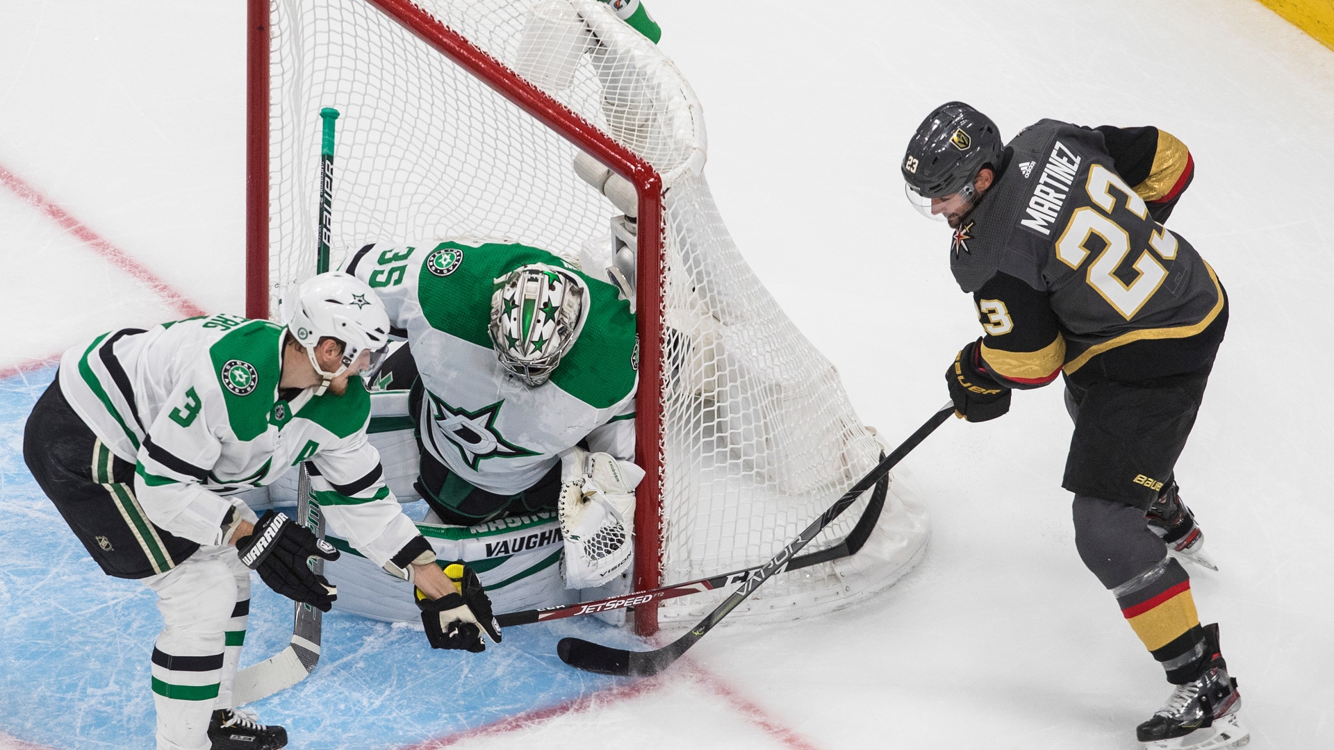 Anton Khudobin et Alec Martinez