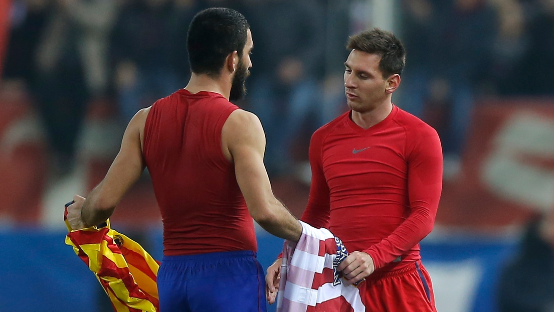 Arda Turan et Lionel Messi