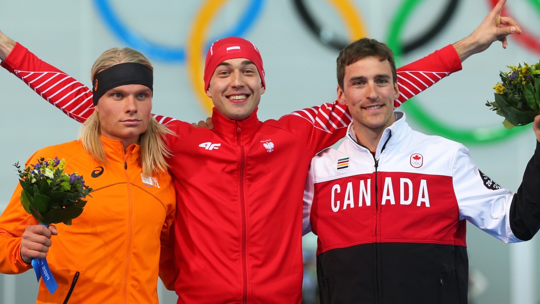 Denny Morrison sur la troisième marche du podium